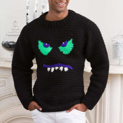 RED HEART MONSTER FACE SWEATER