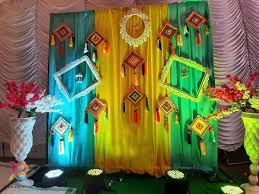 A peacock themed decoration for a mehndi ceremony is a great way to bring  vibrancy and elegance to the event. | Delhi NCR